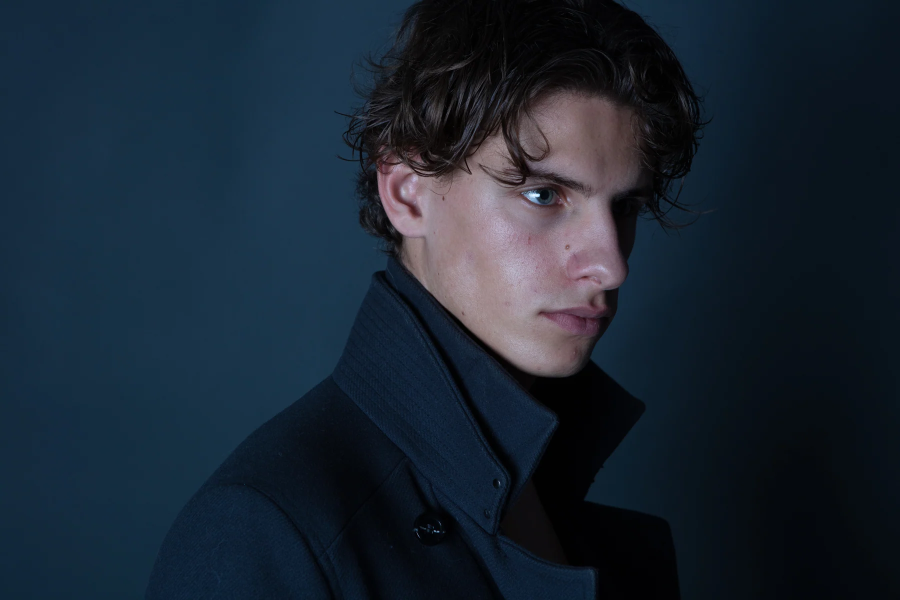 Blue portrait with a high collar