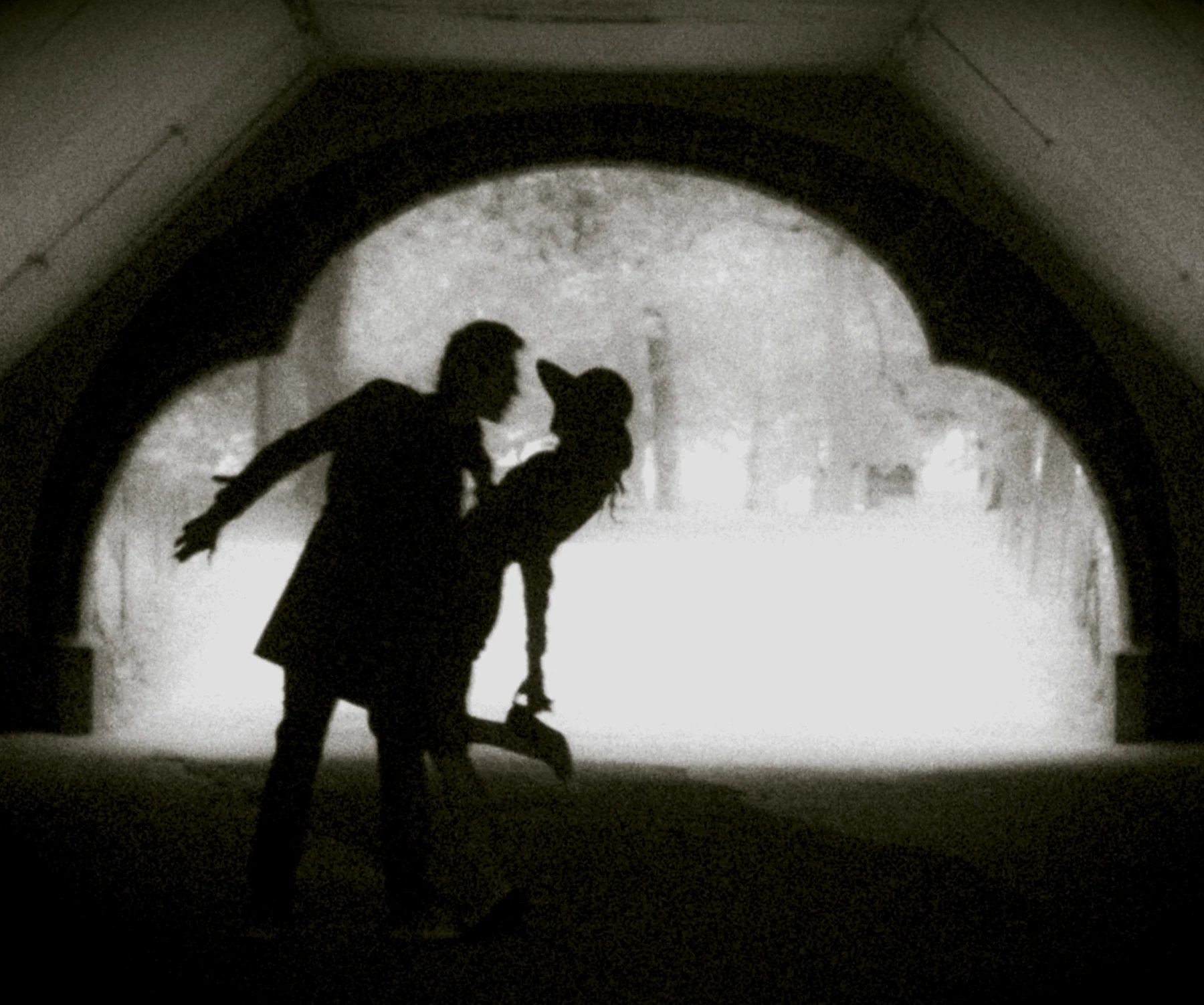 Silhouettes in a tunnel