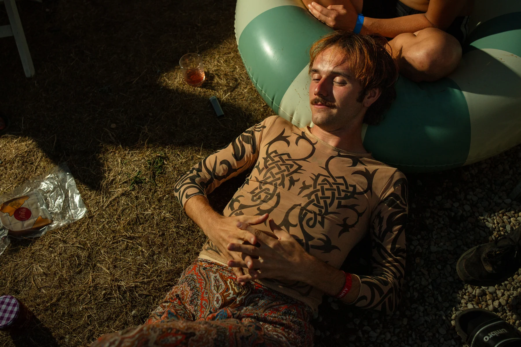 Reclining beside a swimming ring