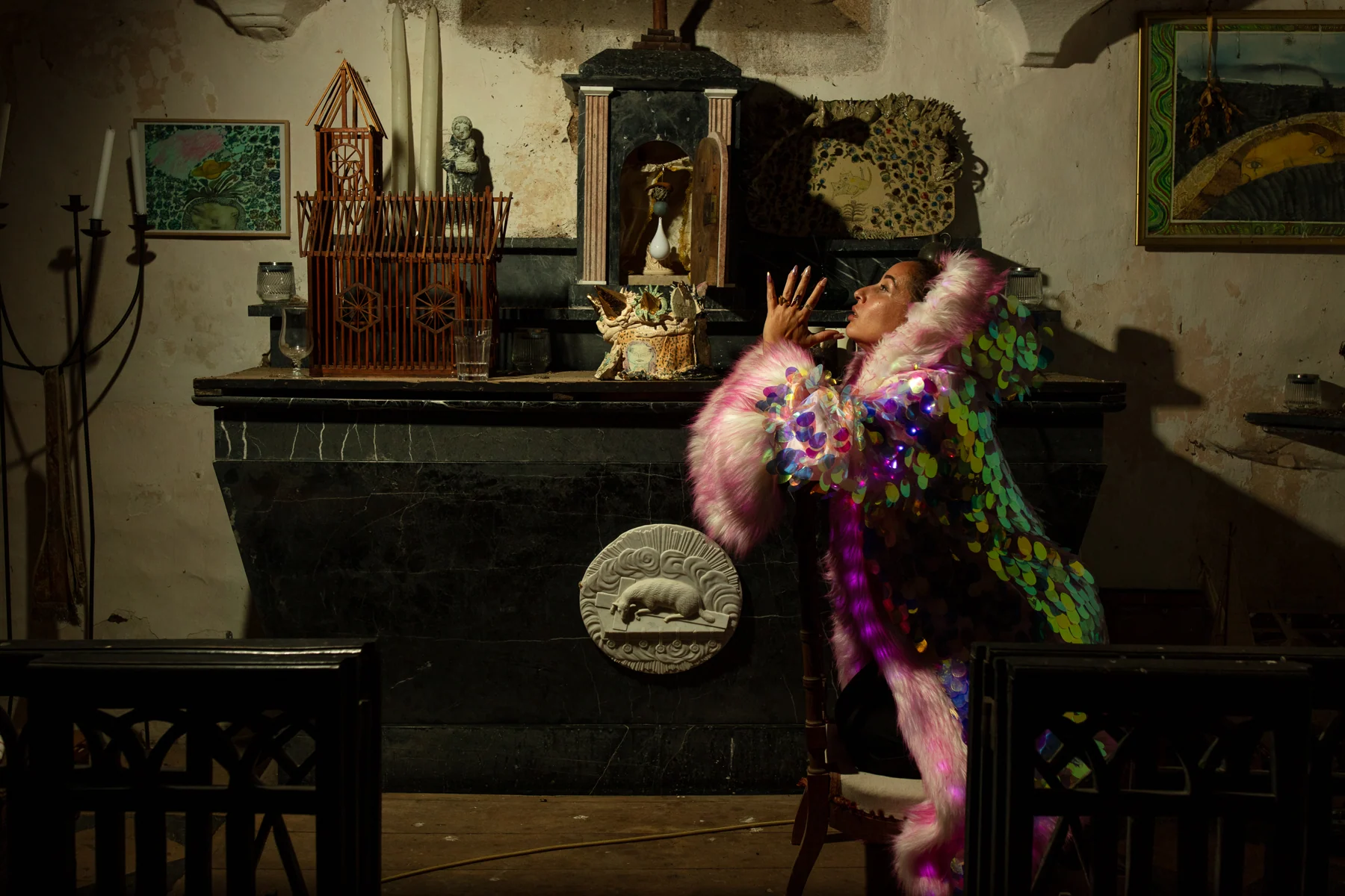 Sequin coat by the mantelpiece