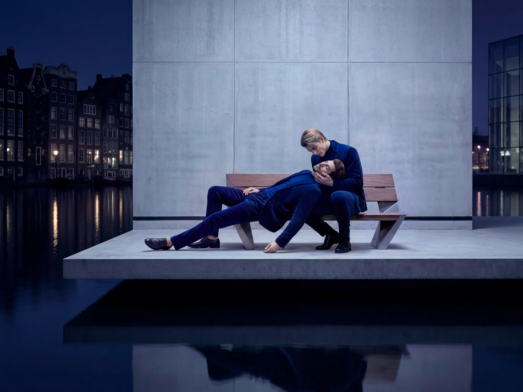 Blue suits on a bench